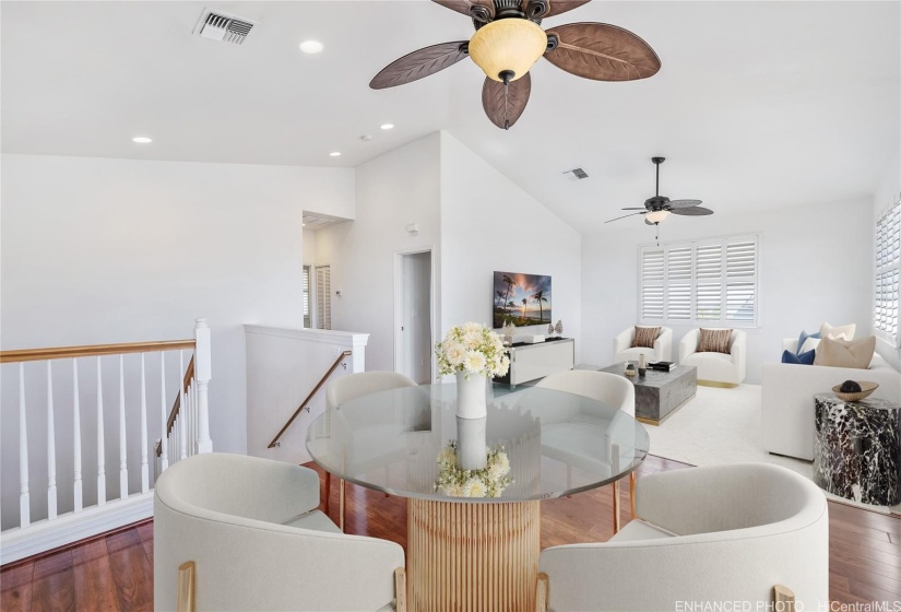 Second floor: Living room & formal dining area. Virtually staged & enhanced photo.