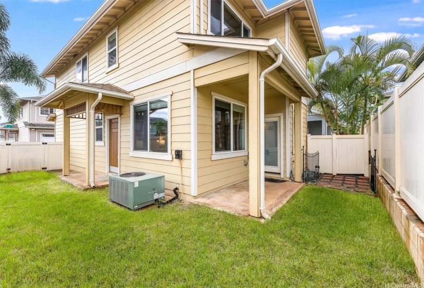 Private, fenced-in backyard with covered lanai.