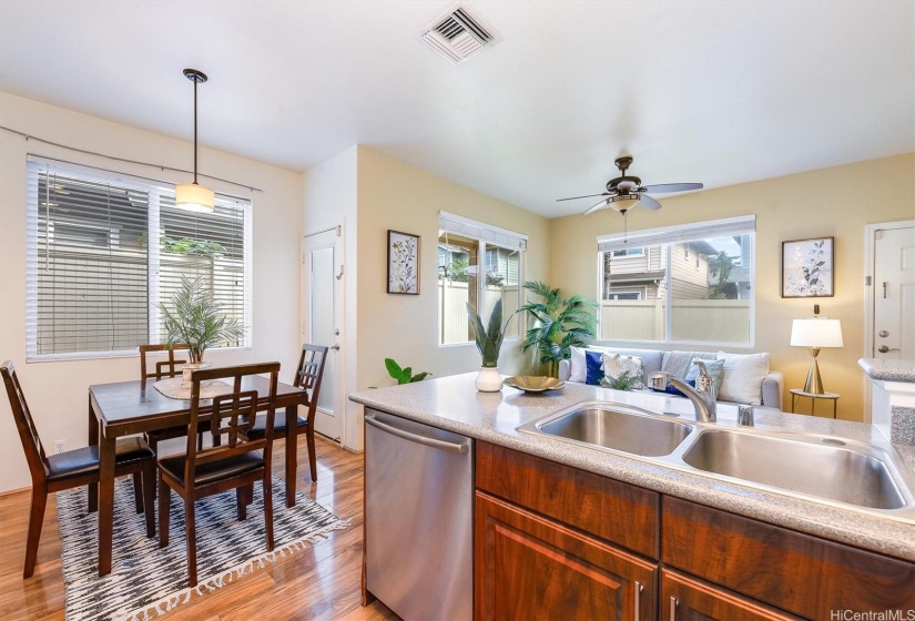 Dining area flows to outdoor area with covered lanai.