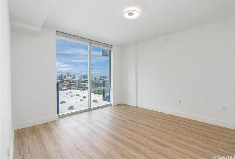 Primary Bedroom with luxury vinyl flooring