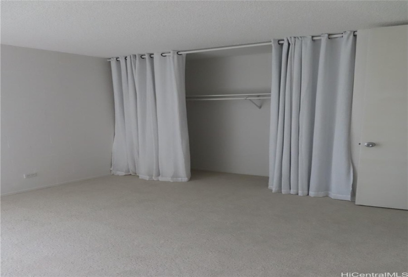 Bed room facing closet