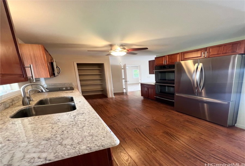 Kitchen with Jenn-air double oven and bread warmer