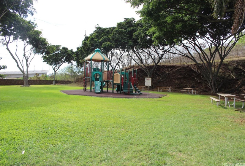 Kids playground and tables ready for picnic.