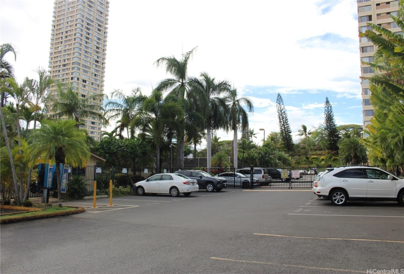 Lots of guests parking, with security house on the left is 24/7 and the gate to go inside the condo.