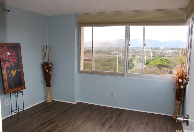 Bedroom with beautiful panoramic views of the city and mountains.