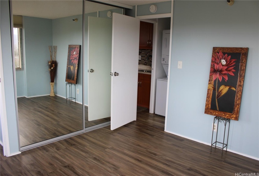 Bedroom opens to kitchen and bathroom.
