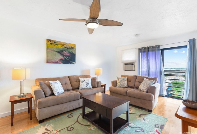 This is a view of the living room overlooking ocean and Pearl Harbor.