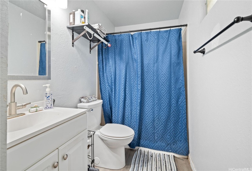 bathroom in the primary bedroom.