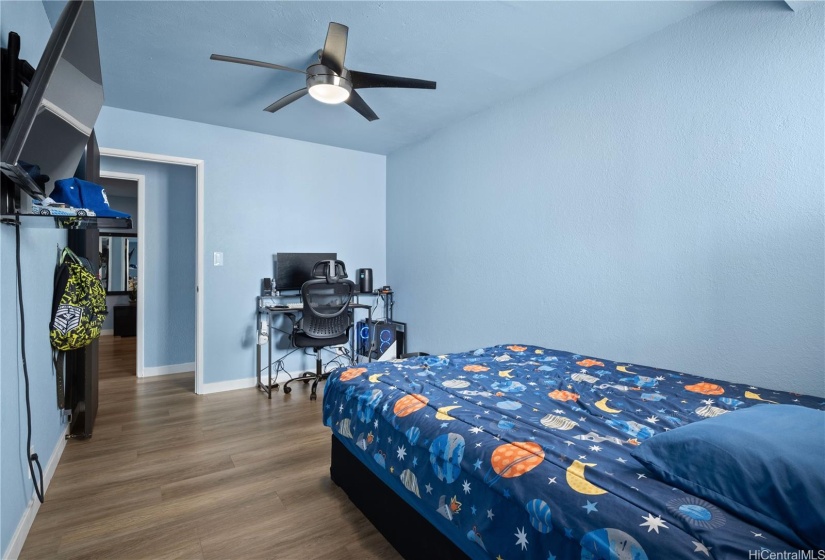 Secondary bedroom with window AC unit - Mounted TV will stay.