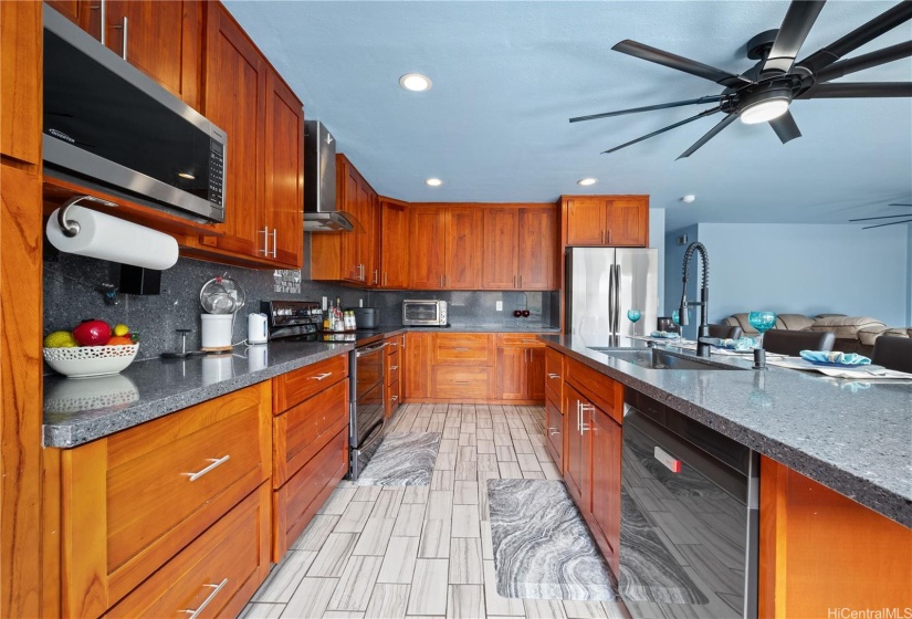 View of the refrigerator and dishwasher, which were just replaced this year.