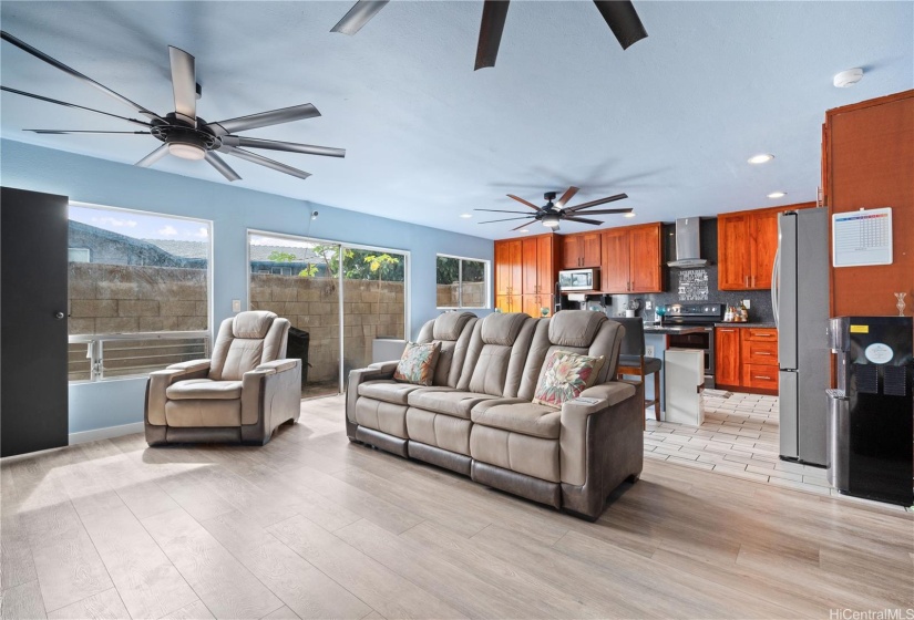 notice the kitchen is an open concept transitioning into the living room.