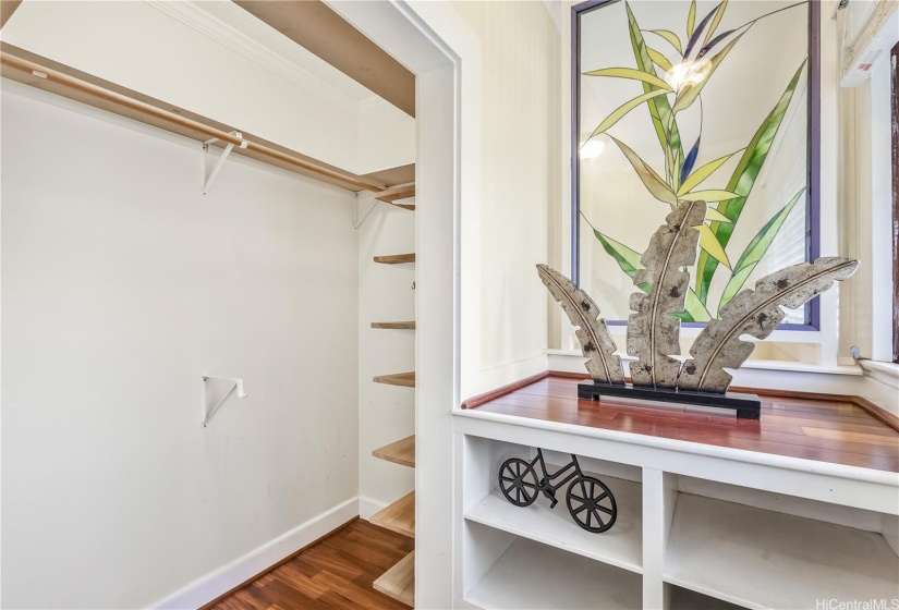 Primary Bedroom walk in closet