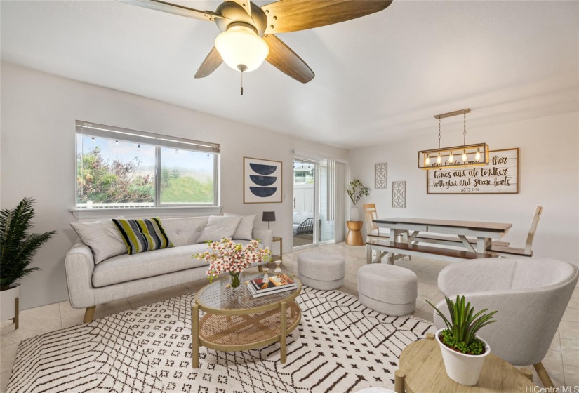 Living Room and Dining Room with access to private yard area. This photo has been virtually staged.