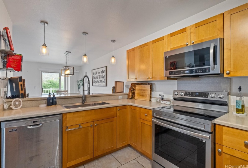Kitchen with updated newer appliances.