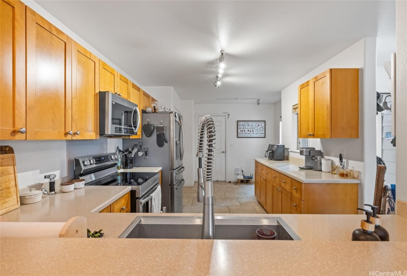Kitchen with access into the garage.