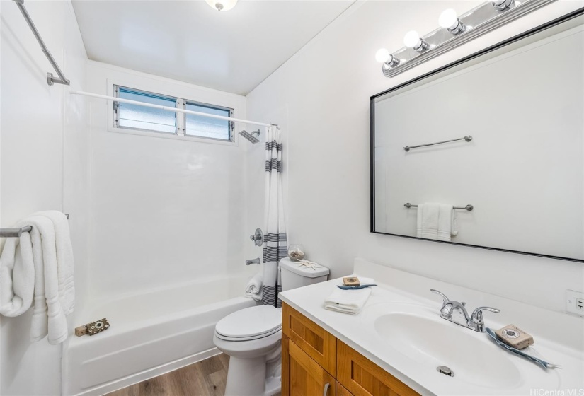 The upstairs bath features a tub just reglazed.