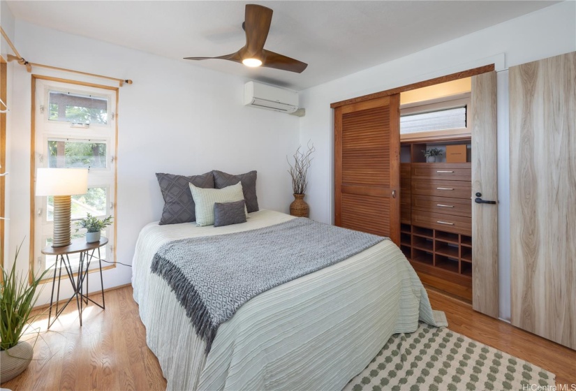 Spacious bedroom with built in closet system