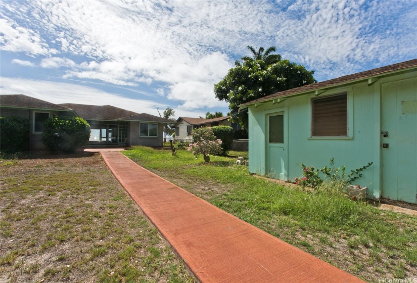 Main house from carport - lots of land and lots of possibilities