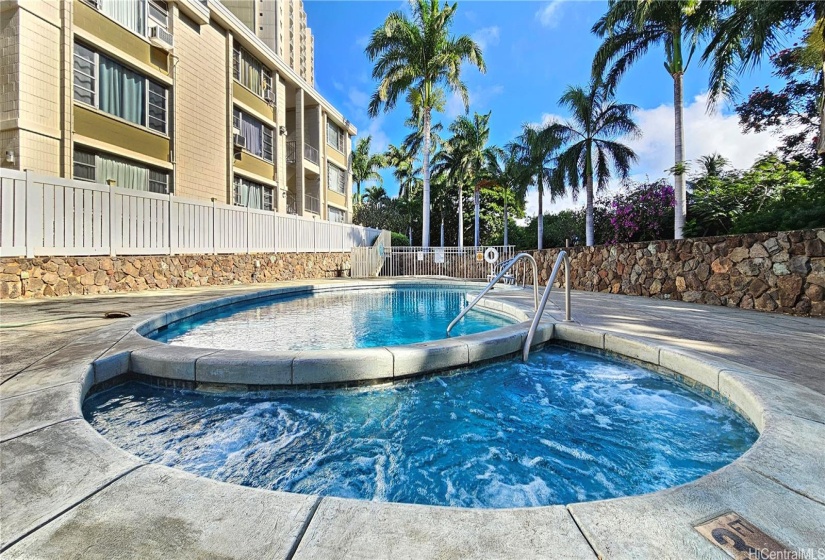 Condo Assoc Pool w/ whirpool