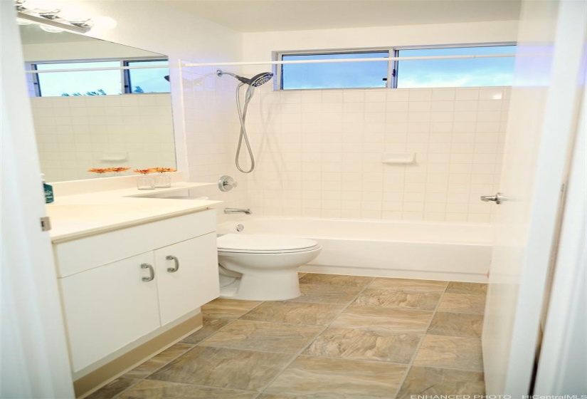 Enhanced Main Bath  - New Floor, Paint, ToiletReglazed Bathtub
