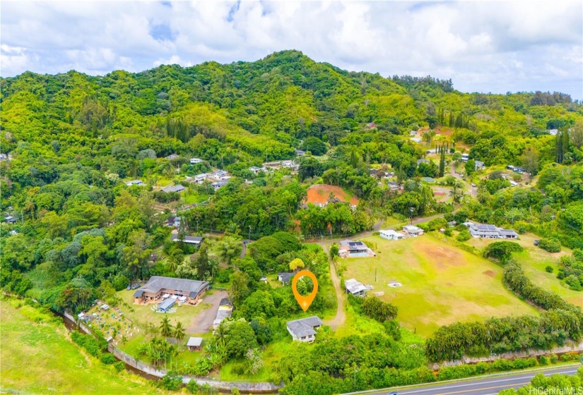 This enchanting property invites you to leave the rush of modern life behind and explore the lush Windward countryside.Ehanced Photo