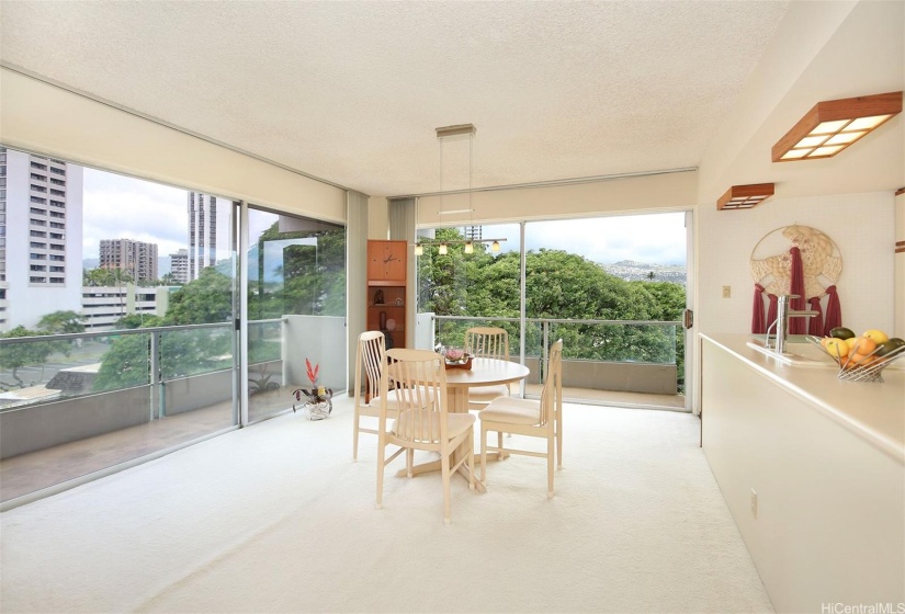 Two separate lanais frame the dining area, providing an indoor outdoor feel