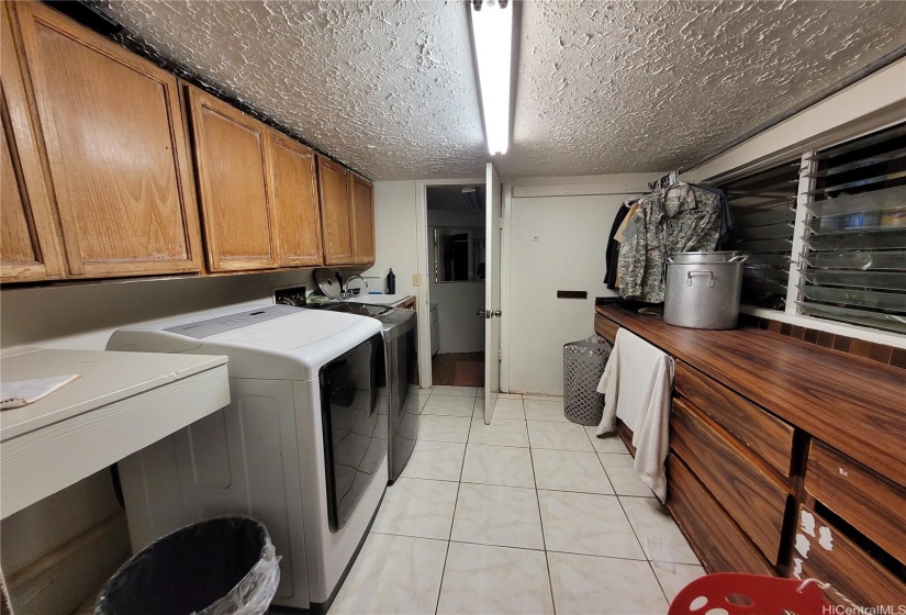 Upstairs laundry room.