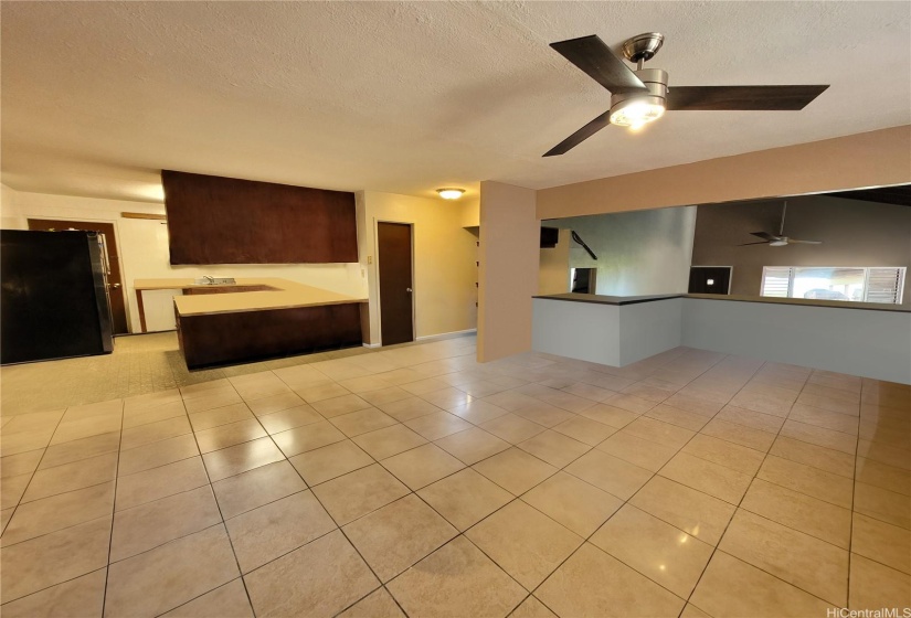 Contemporary style dining room overlooking the living. Virtually staged.  room