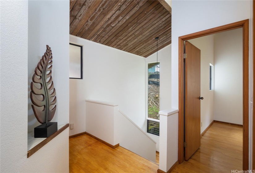 The second story, where the bedrooms are, has lovely high ceilings, and the walls offer great space for your favorite artwork