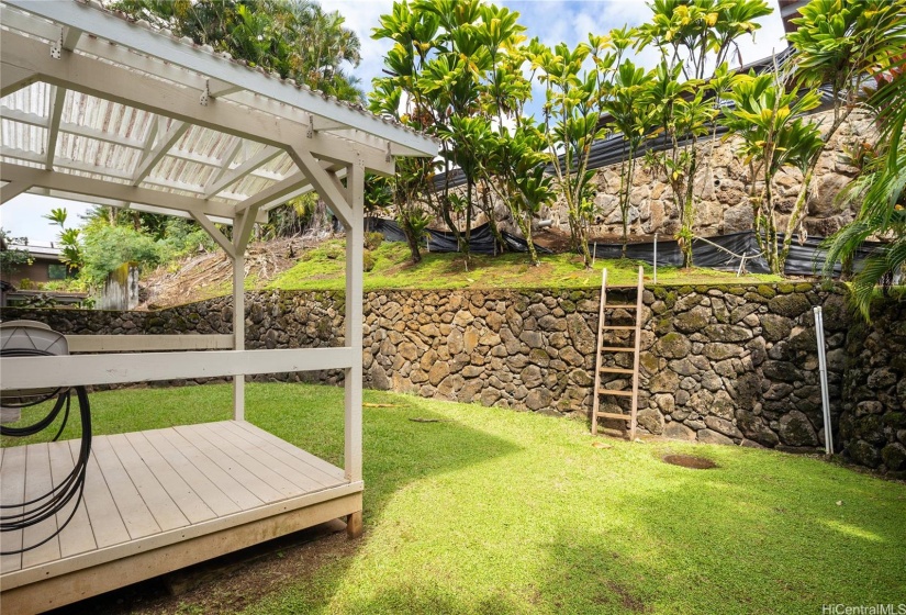 The flat yard area is a great plus!  The ladder goes up to the second tier of the lot.