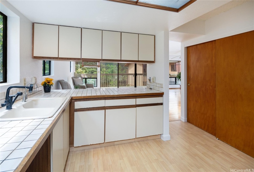 Check out the closet to the right, which can be a wonderful pantry or storage area.