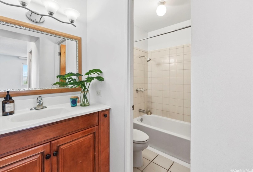 To the left of the vanity, not seen here is a closet to help keep your thing organized.