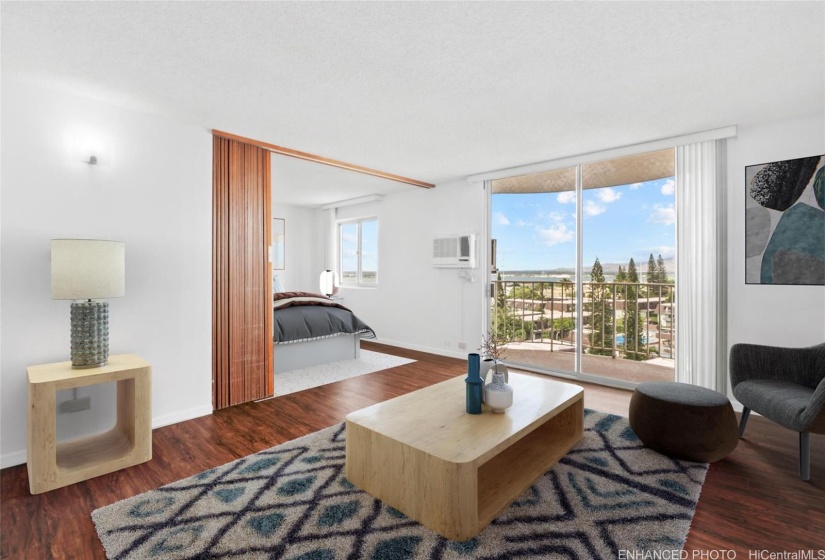 Enhanced virtually staged. Living area with accordion door to separate your private space as needed.