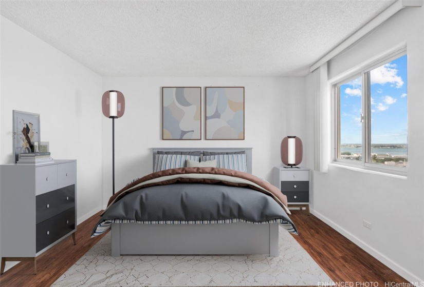 Enhanced virtually staged. Spacious ensuite bedroom with walk in closet.