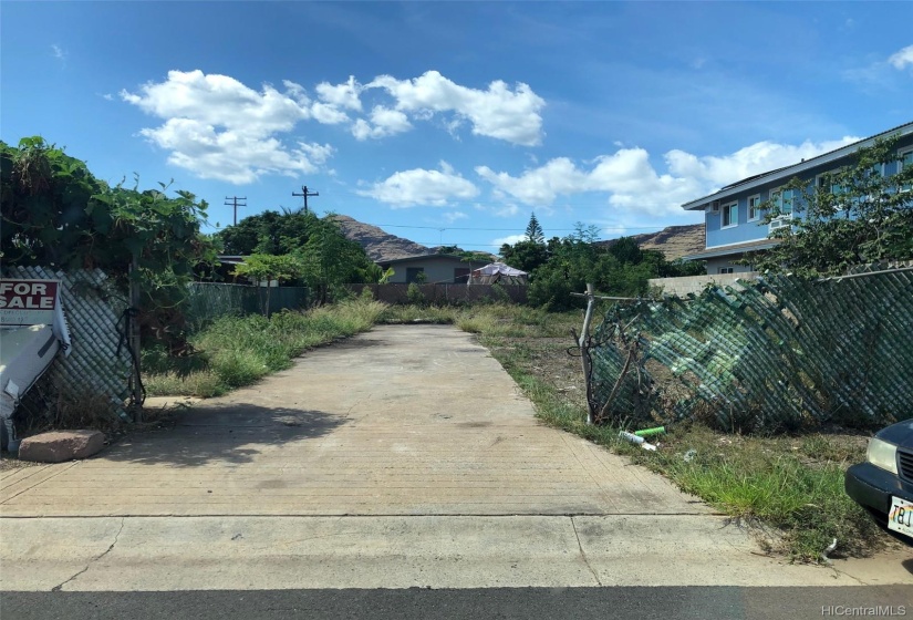 View of vacant lot from the street.