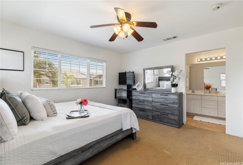 PRIMARY BEDROOM  UPSTAIRS WITH ENSUITE BATH & WALK IN CLOSET.  UPSTAIRS CARPETS NEED TO BE CHANGED. SELLER GIVING CLOSING COST CREDIT INSTEAD OF CHANGING CARPETS