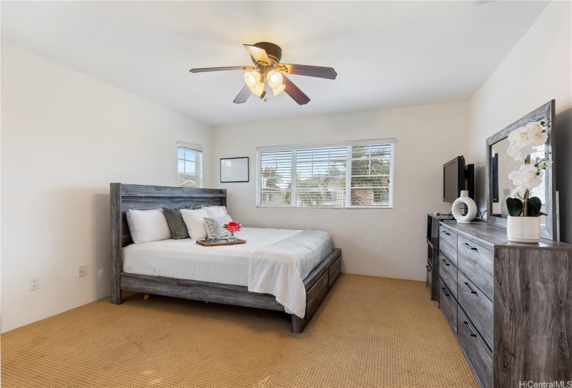 PRIMARY BEDROOM  UPSTAIRS WITH ENSUITE BATH & WALK IN CLOSET.  UPSTAIRS CARPETS NEED TO BE CHANGED. SELLER GIVING CLOSING COST CREDIT INSTEAD OF CHANGING CARPETS