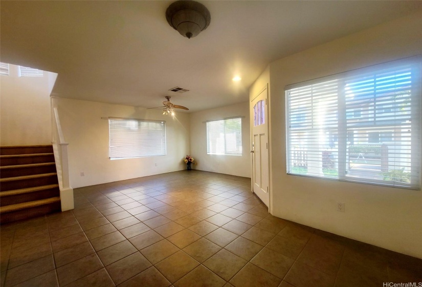 LIVING ROOM HAS CERAMIC TILES & FAN