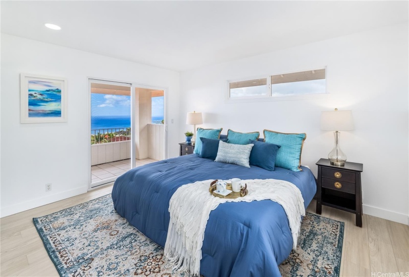 The upstairs Suite accesses the front covered lanai for enjoying the ocean and Diamond Head views. What a lovely way to start the day!