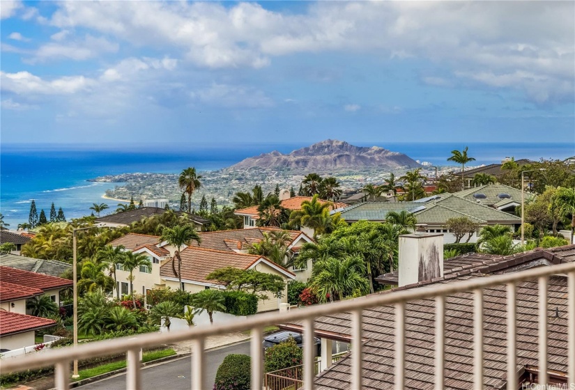 Upstairs lanai off of second primary suite with en-suite bathroom is also accessible from a second upstairs bedroom.