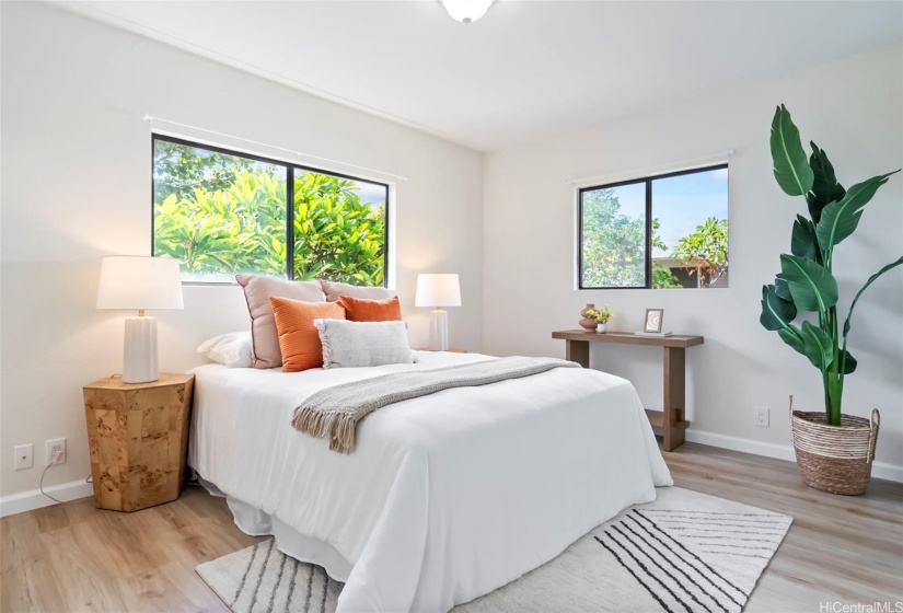 Primary bedroom with natural lighting