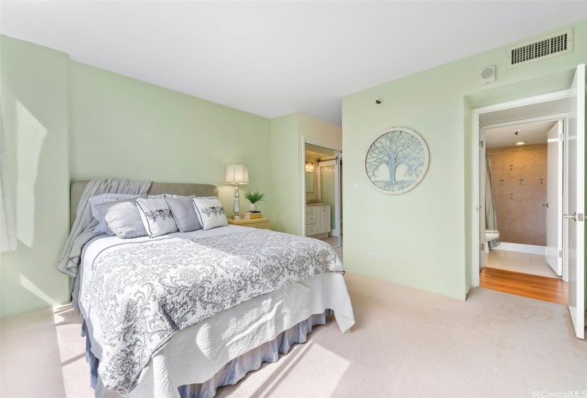 Spacious primary bedroom with en suite bathroom