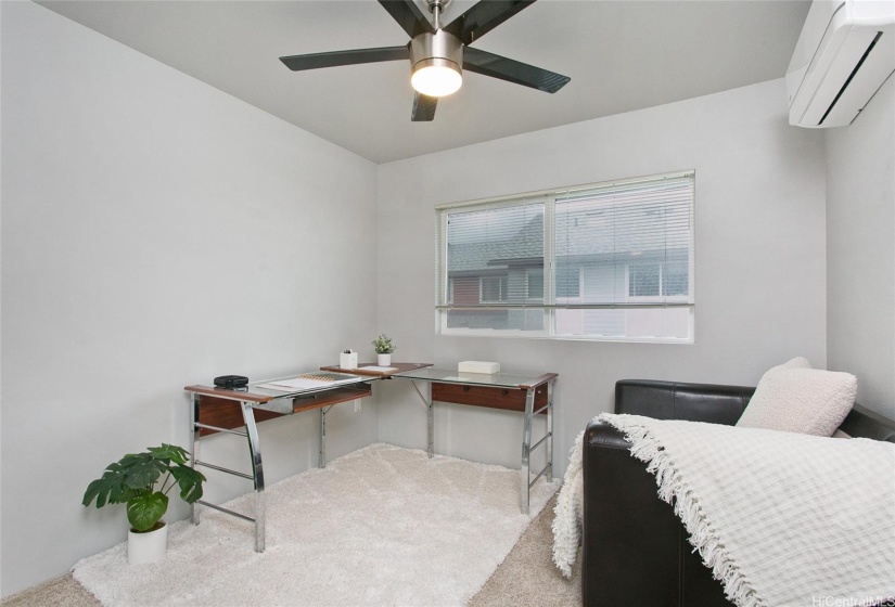 Bedroom 3 with split AC and ceiling fan