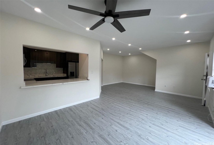 Spacious Living Area with recessed lighting