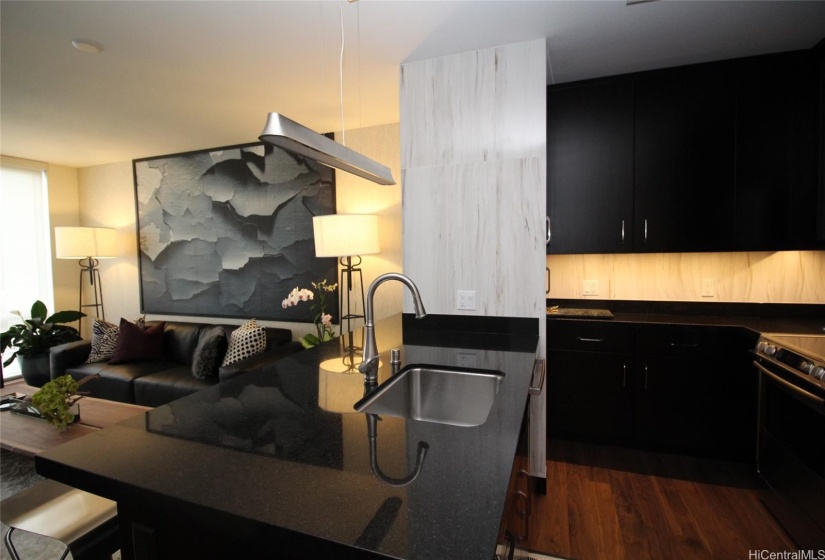 Living room flows into kitchen area.