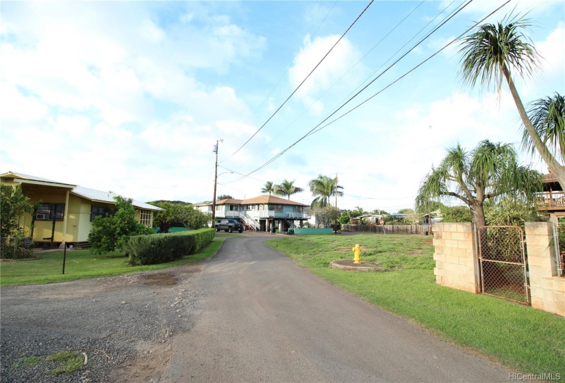 Looking towards the lot on the right from Kaika Pl