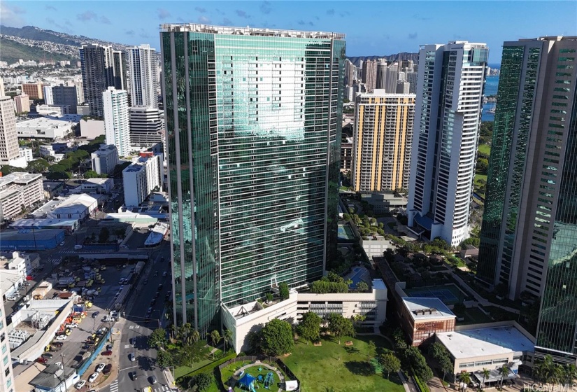 Iconic wing shaped building at the heart of Kakaako with Kolowalu park next door