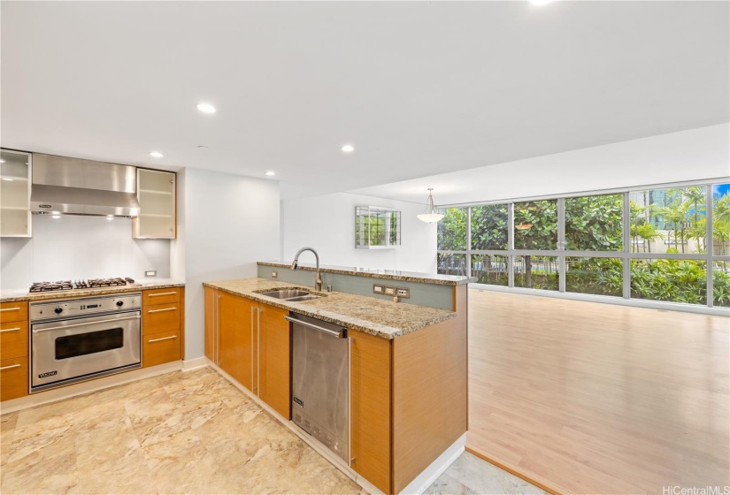 Chefs kitchen with viking appliances and counter top seating