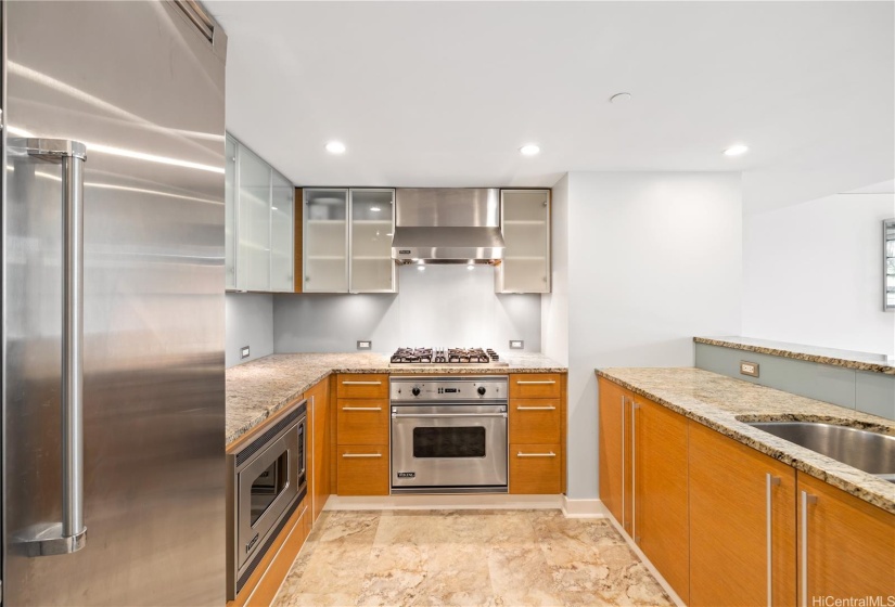 Chefs kitchen with viking appliances and counter top seating