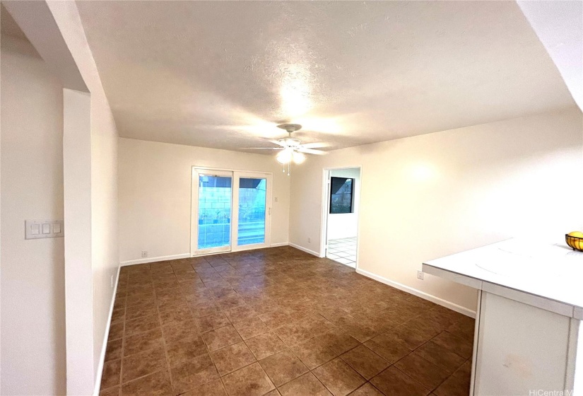 sliding door off kitchen/family area for easy access to outdoor spaces